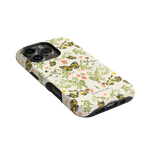 Monarch iPhone case featuring a floral design with butterflies on a cream background and black edges.