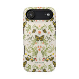 Monarch iPhone case featuring a floral design with butterflies in green, yellow, and pink tones on a light background.