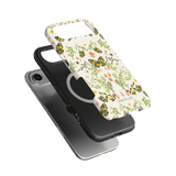 Monarch iPhone case featuring a floral design with butterflies, layered over a black phone case.