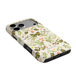 Monarch iPhone case featuring a floral and butterfly design in yellow, green, and pink on a light background.