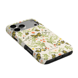 Monarch iPhone case featuring a floral and butterfly design in yellow, green, and pink on a light background.