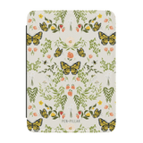 Monarch Kindle case featuring a floral and butterfly design in yellow, green, and pink on a light background.