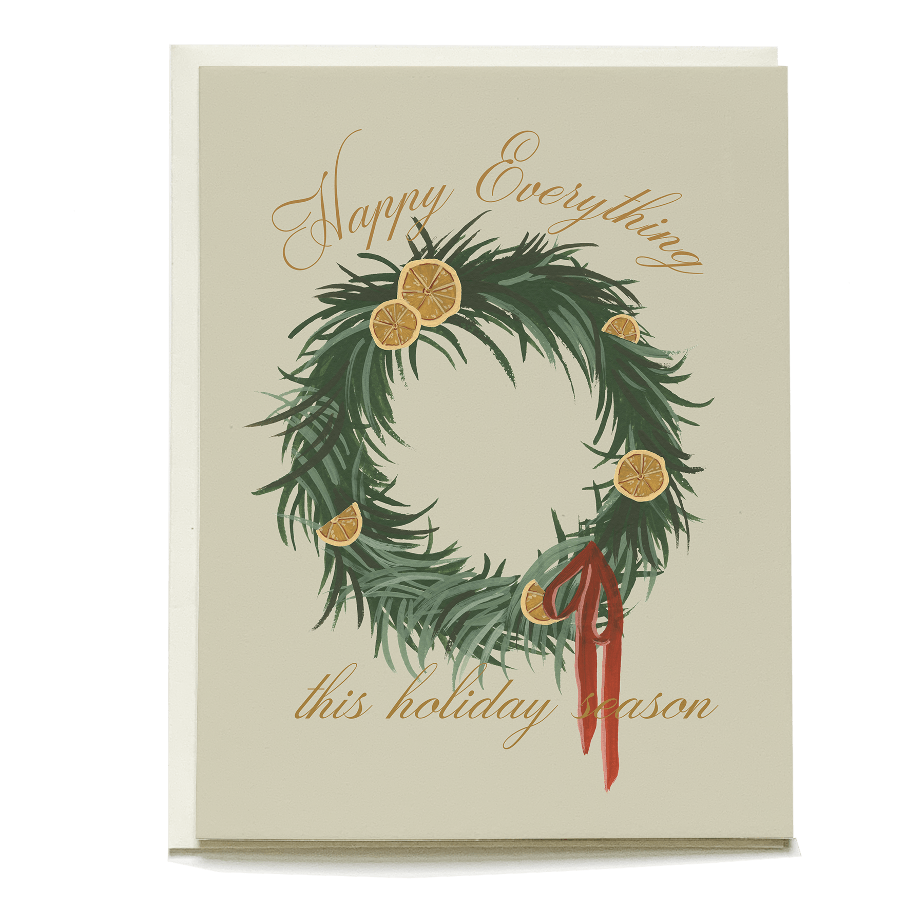 Orange wreath holiday card featuring dried orange slices, green pine branches, and a red ribbon with gold text.