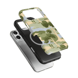 Orchard iPhone case featuring a green landscape design with trees, layered over a black and clear case.