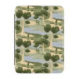 Orchard Kindle case featuring a green and beige tree pattern on a light blue background.