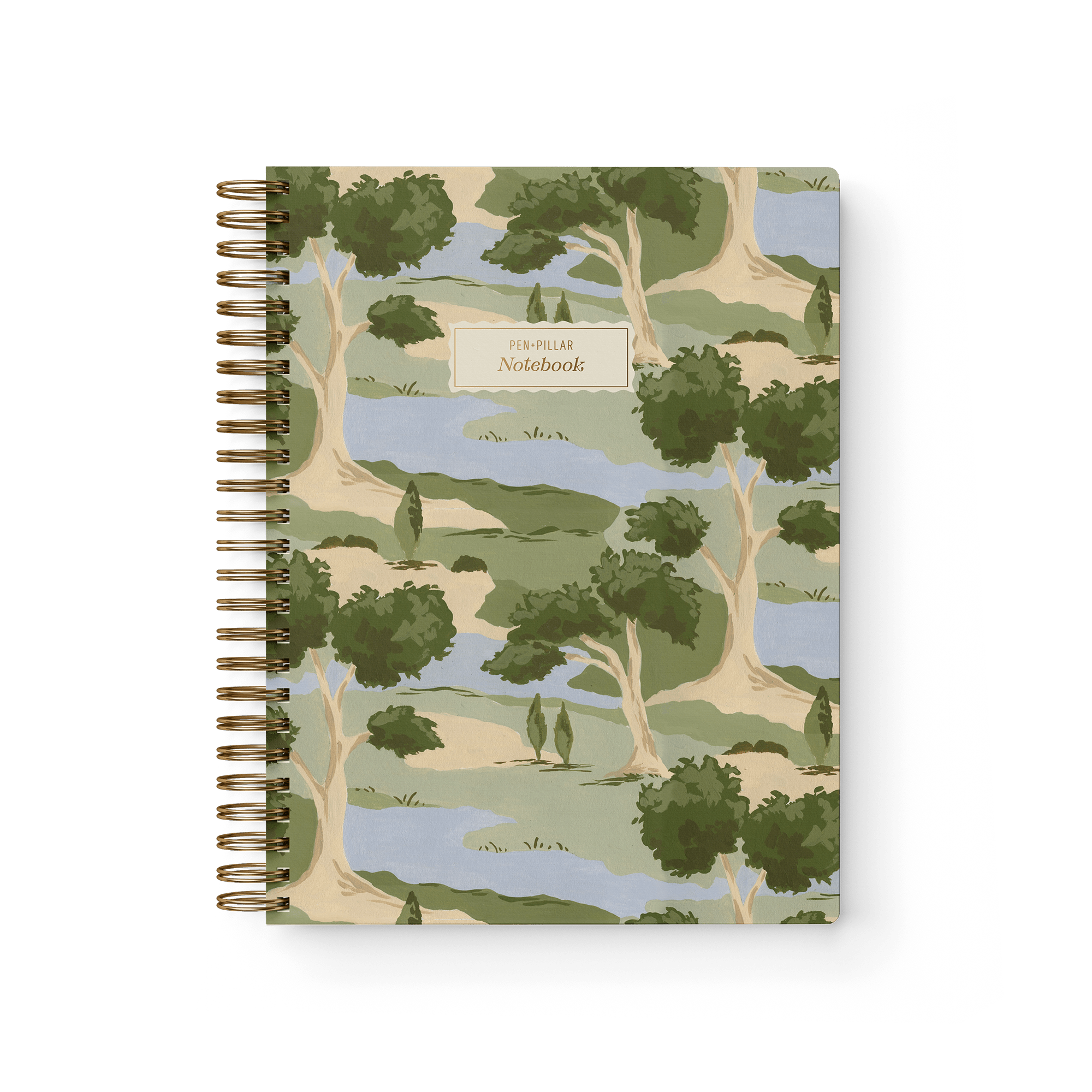 Orchard notebook featuring a landscape design with trees and water, spiral binding, and a beige label on the cover.