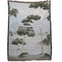 Orchard woven blanket featuring a landscape design with trees and mountains in muted green and beige tones.