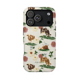 Pasture iPhone case featuring a floral design with cows and flowers in earthy tones on a cream background.