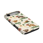 Pasture iPhone case featuring floral designs and illustrations of dogs in various poses on a cream background.