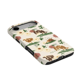Pasture iPhone case featuring floral designs and illustrations of dogs in various poses on a cream background.