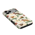 Pasture iPhone case featuring floral patterns and animal illustrations on a cream background with black edges.