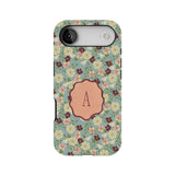 Posy personalized iPhone case featuring a floral design with a monogrammed letter "A" on a light blue background.