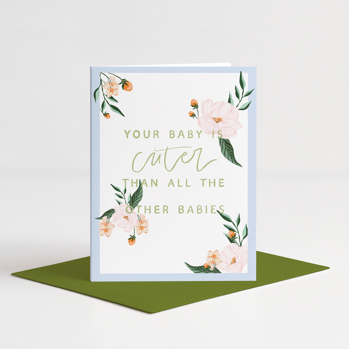 Cutest Baby Card standing on a green envelope
