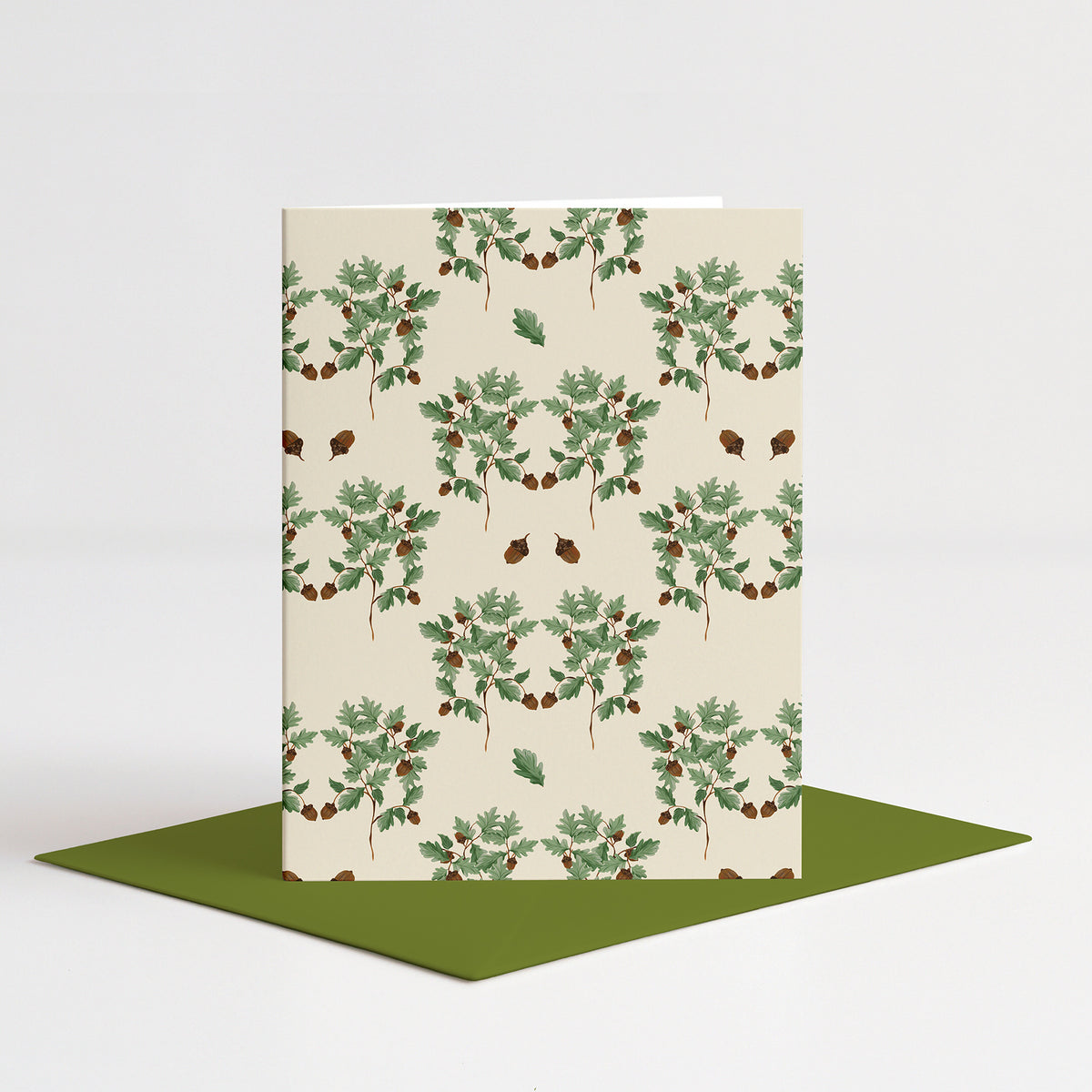 Acorns Blank Card standing on a green envelope