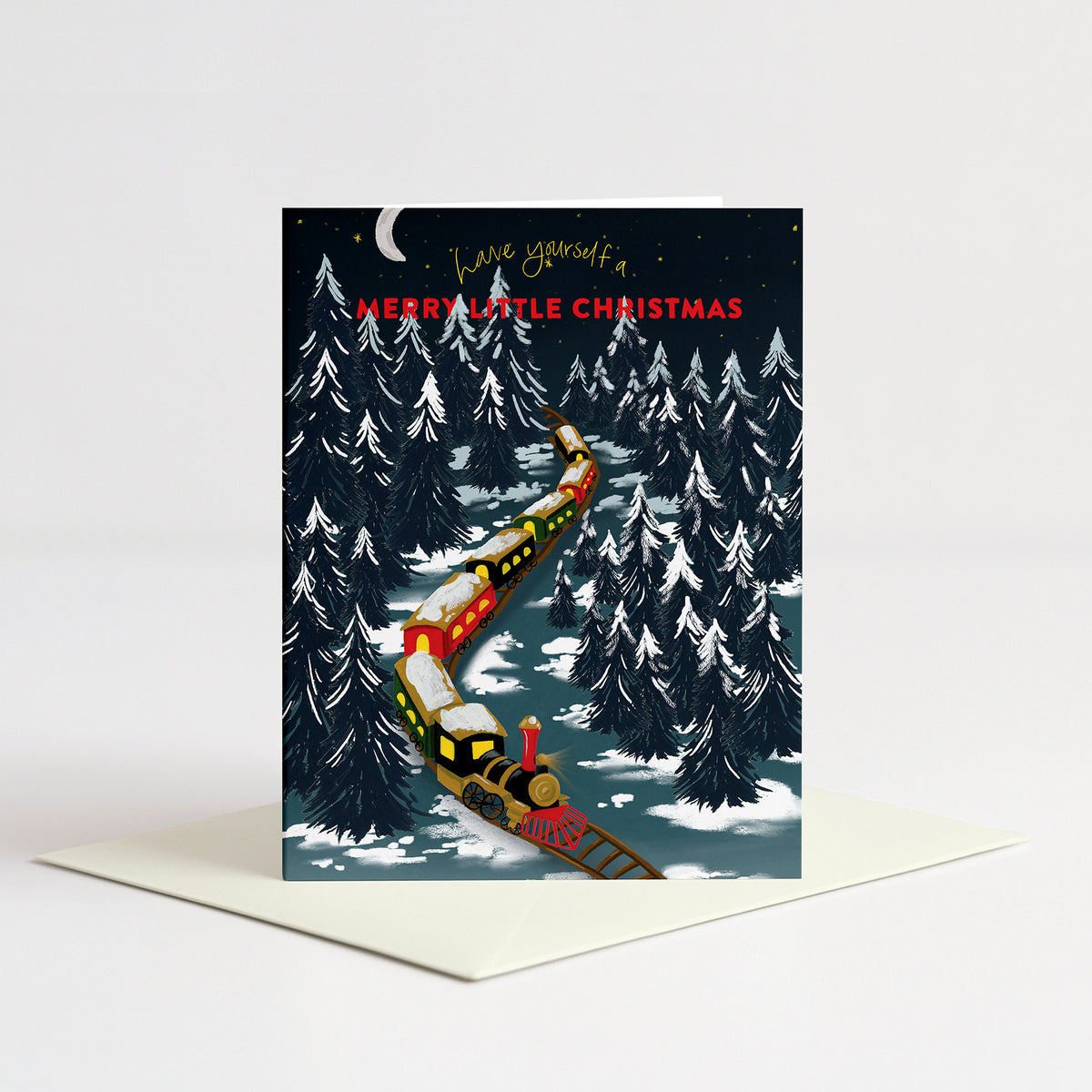 Winter Train Holiday Card standing on a natural cream envelope