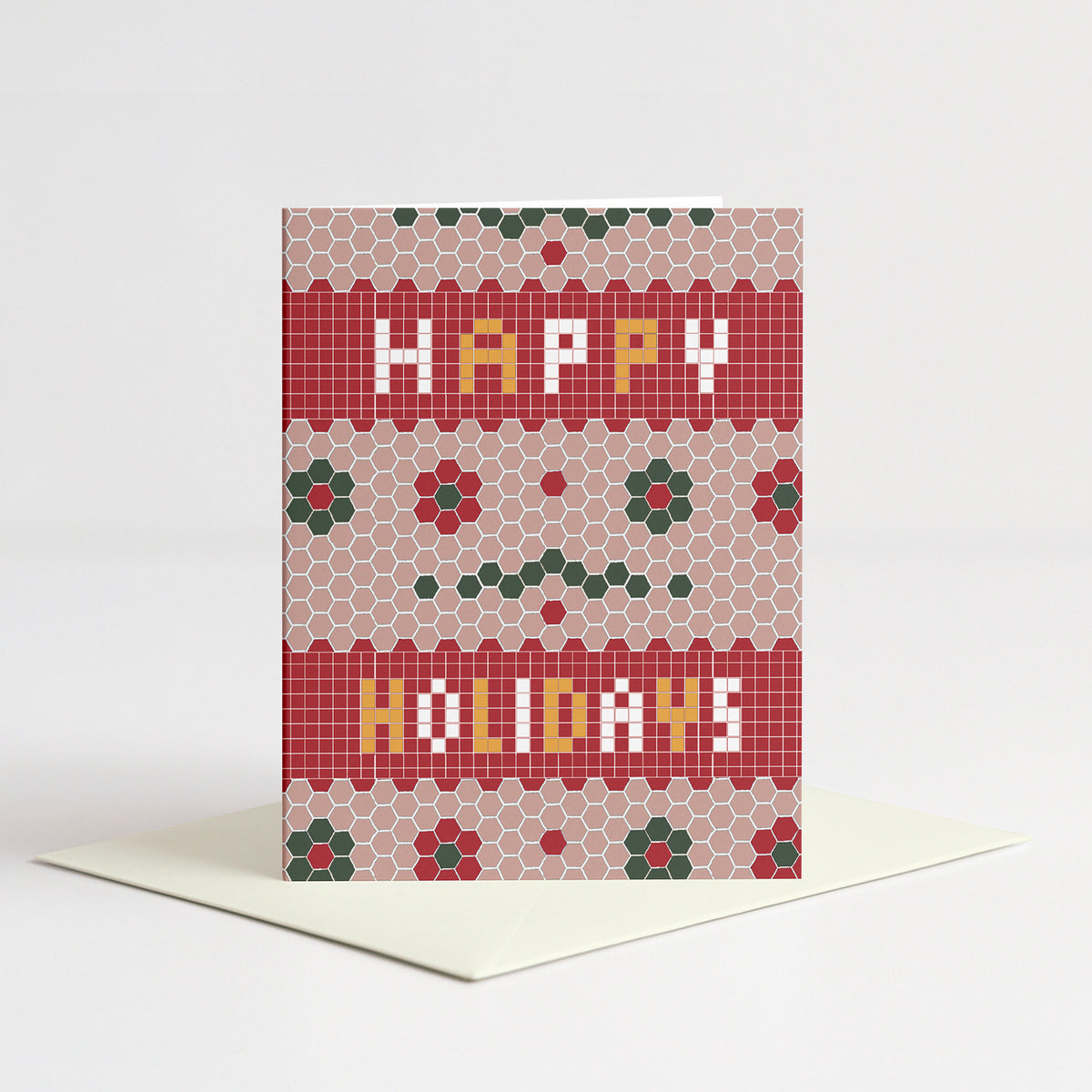 Retro Tile Holiday Card standing on a natural cream envelope