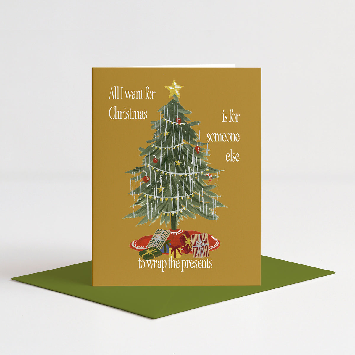 Vintage Tree Holiday Card standing on a green envelope