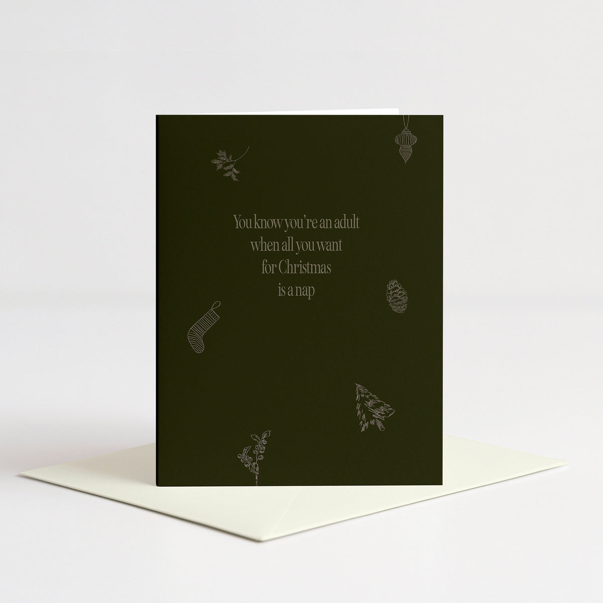 Naptime Holiday Card standing on a natural cream envelope