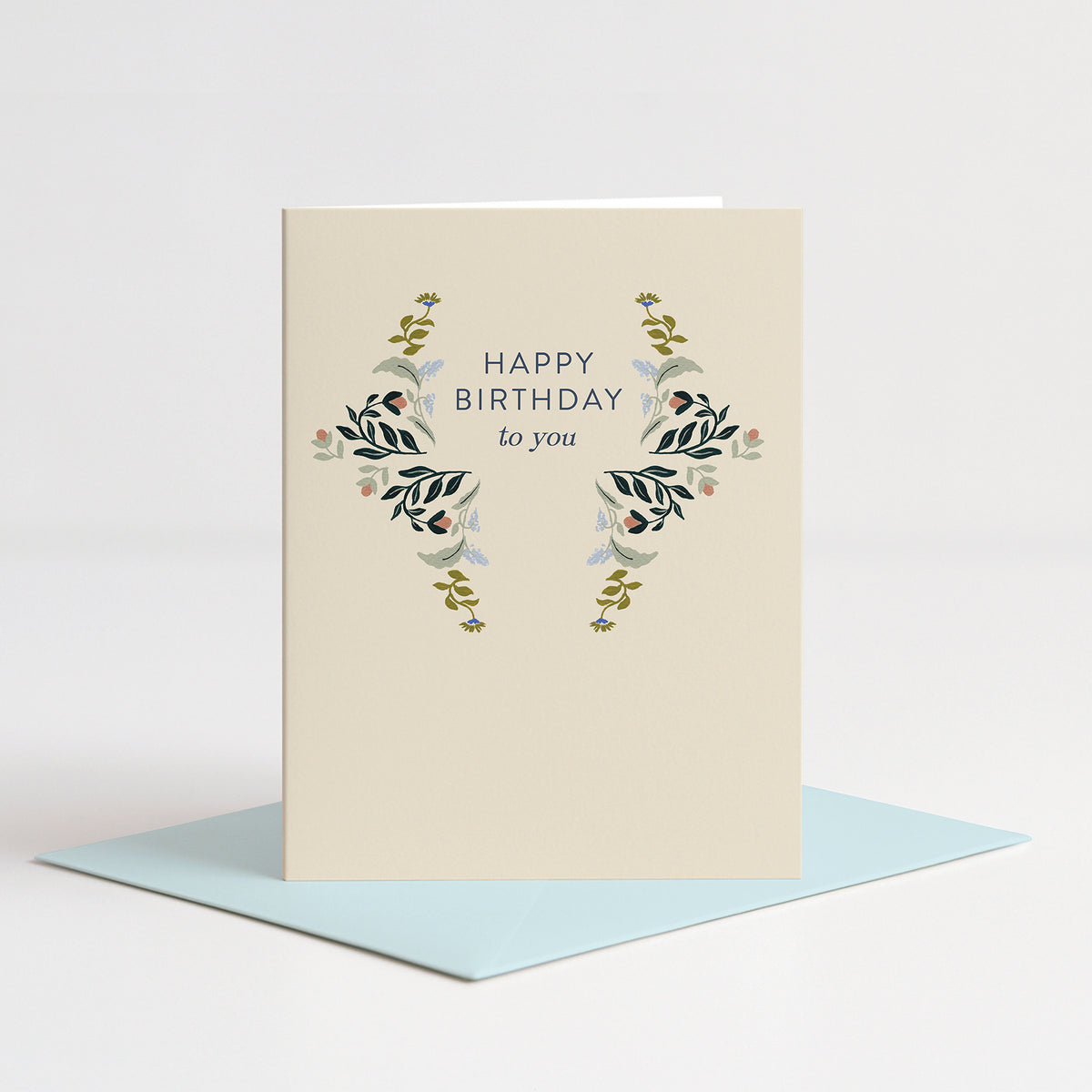 Flutter Birthday Card standing on a light blue envelope