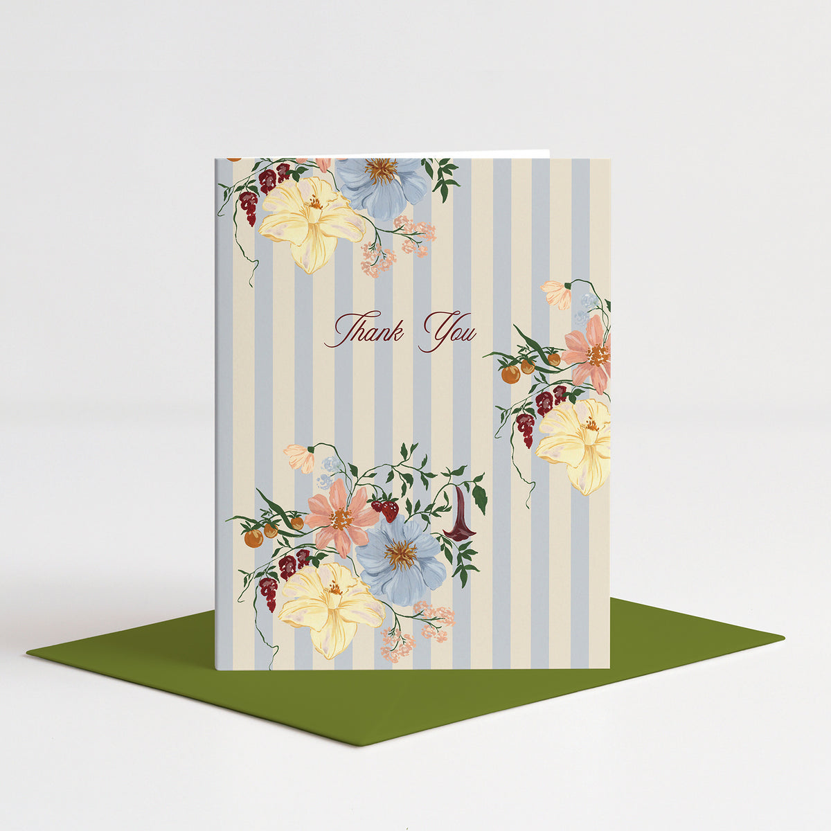 Scarlett Thank You Card standing on a green envelope