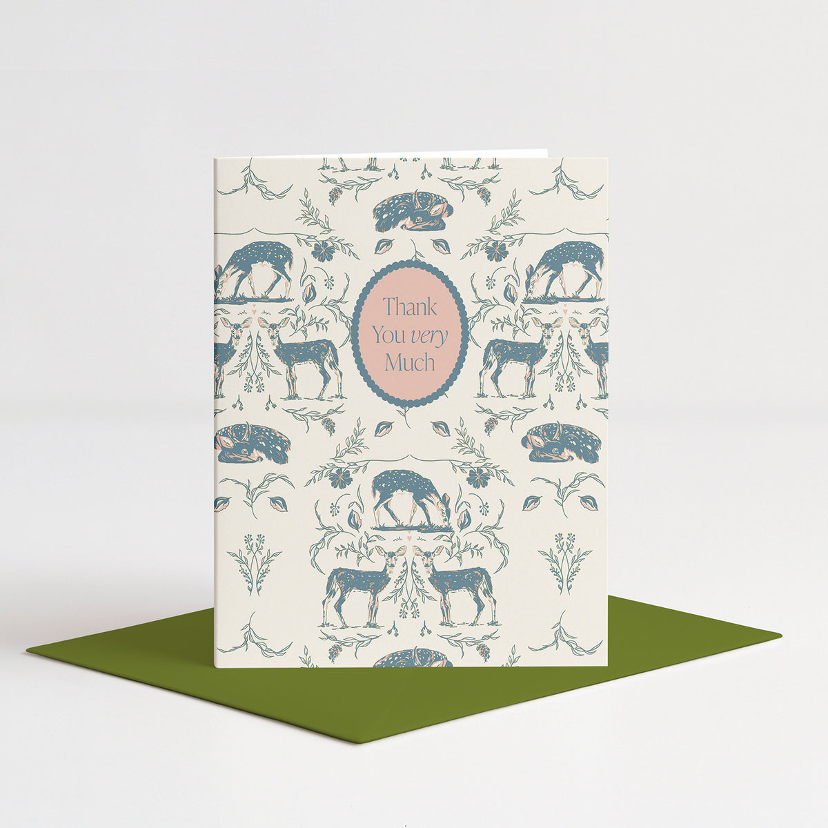 Woodland Thank You Card standing on a green envelope