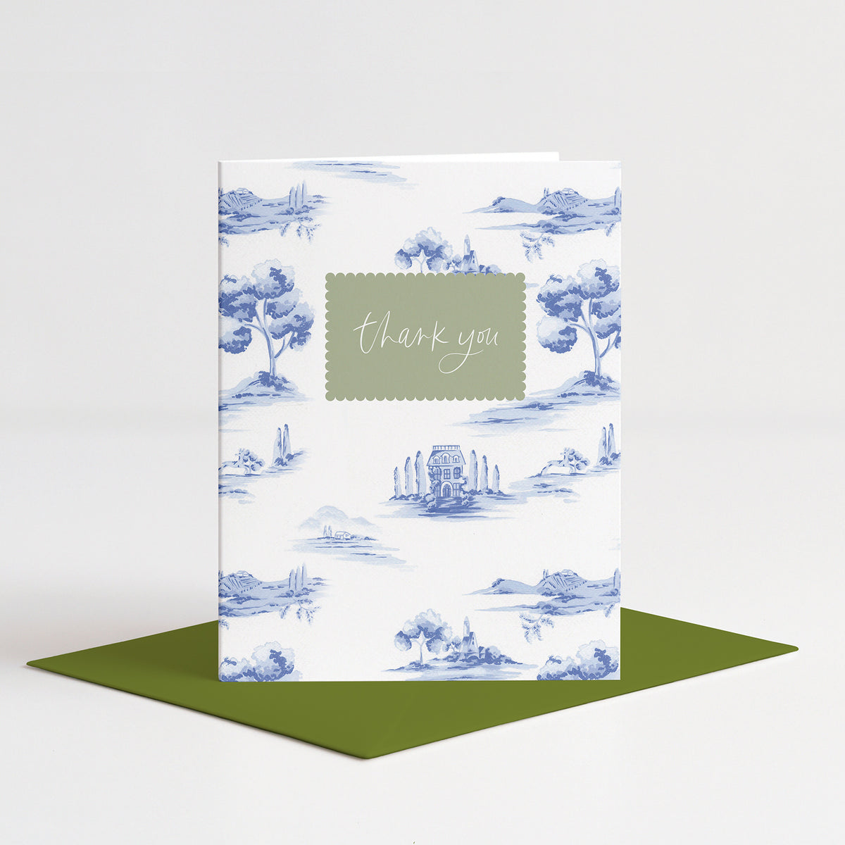 Toile Thank You Card standing on a green envelope