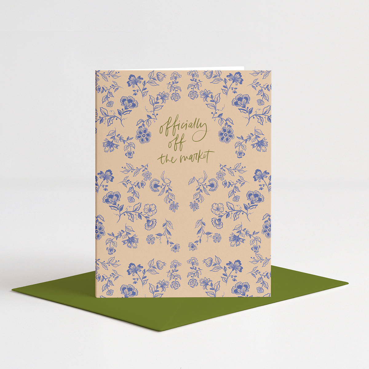 Penelope Wedding Card standing on a green envelope