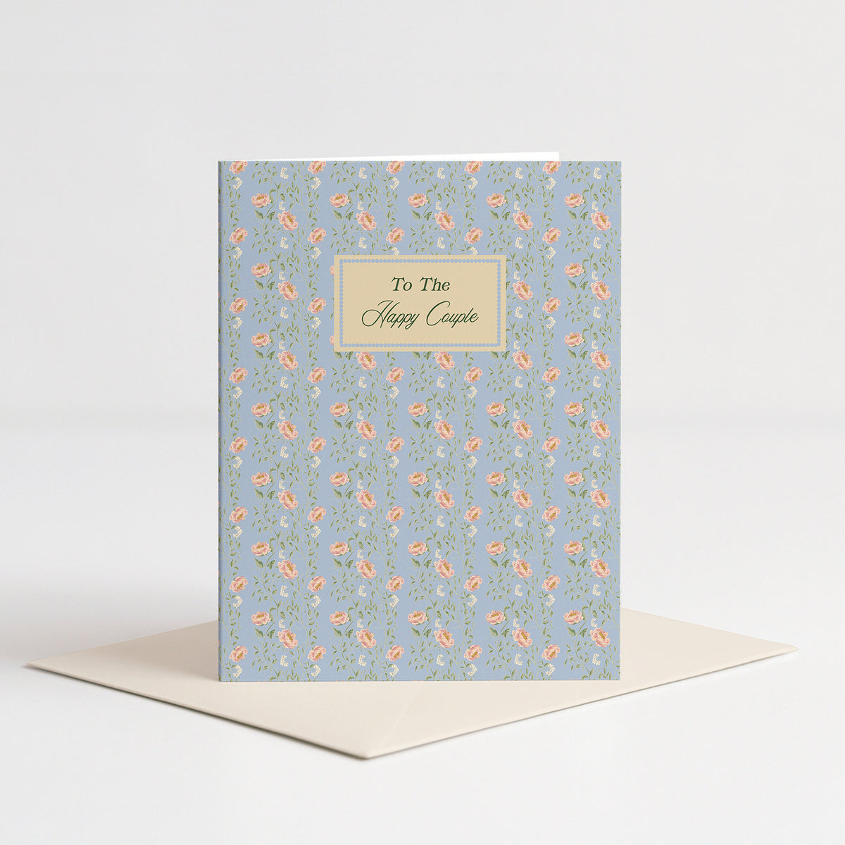 Fable Wedding Card standing on a pale pink envelope