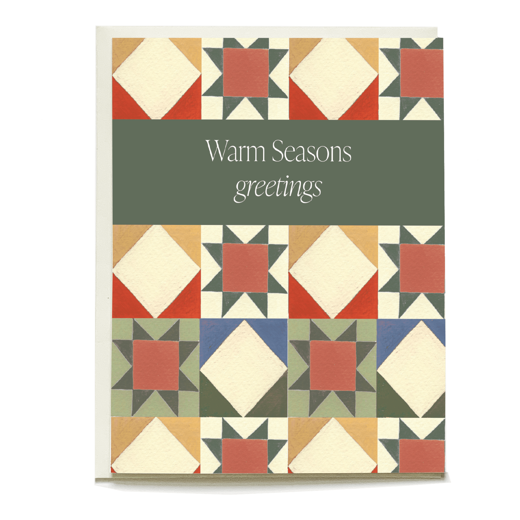 Quilt holiday card featuring a geometric pattern with warm colors and the text "Warm Seasons greetings" in the center.