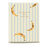 Ripe banana birthday card with yellow bananas and gold text on a striped background.