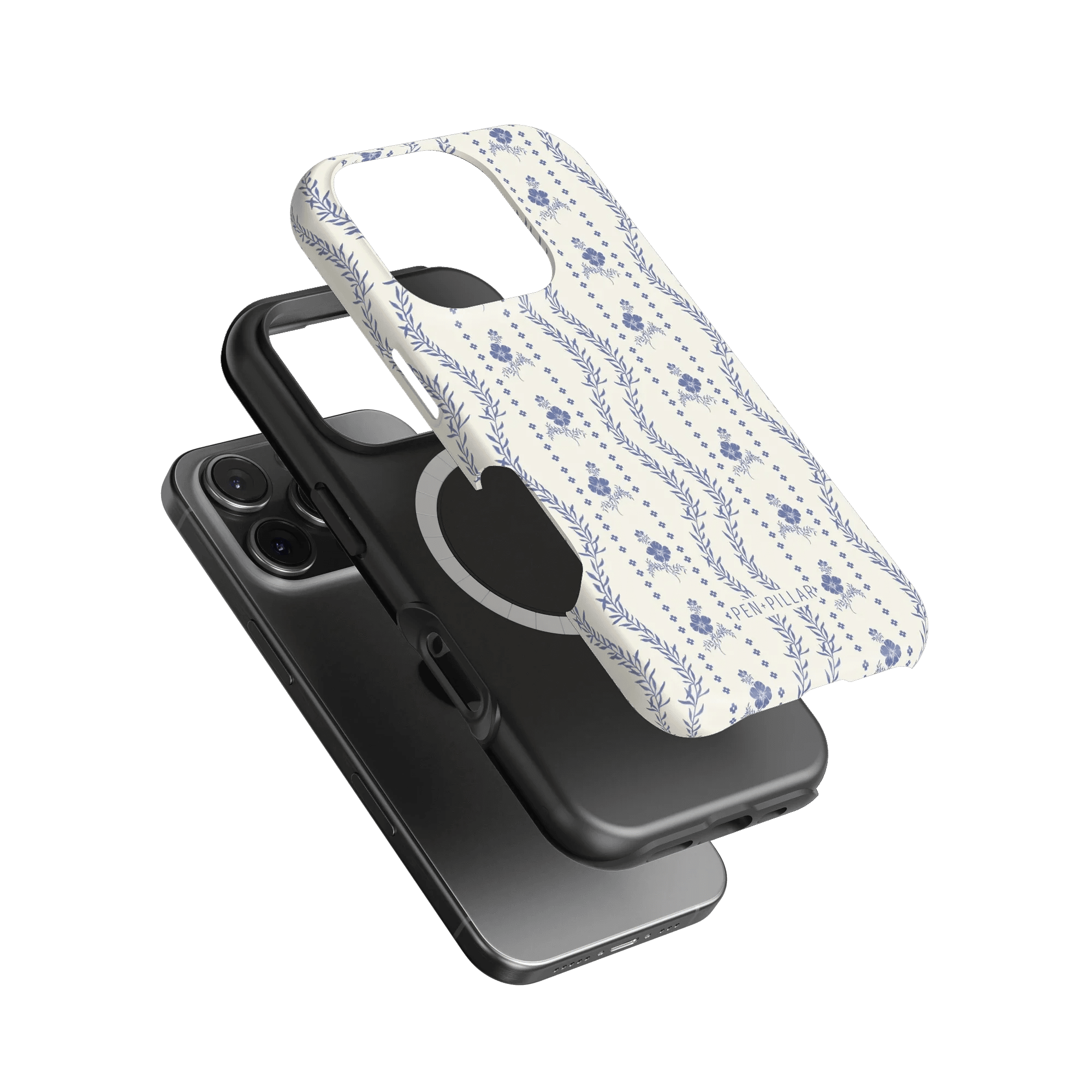 Riviera iPhone case featuring a floral pattern in blue on a white background, layered over a black phone case.