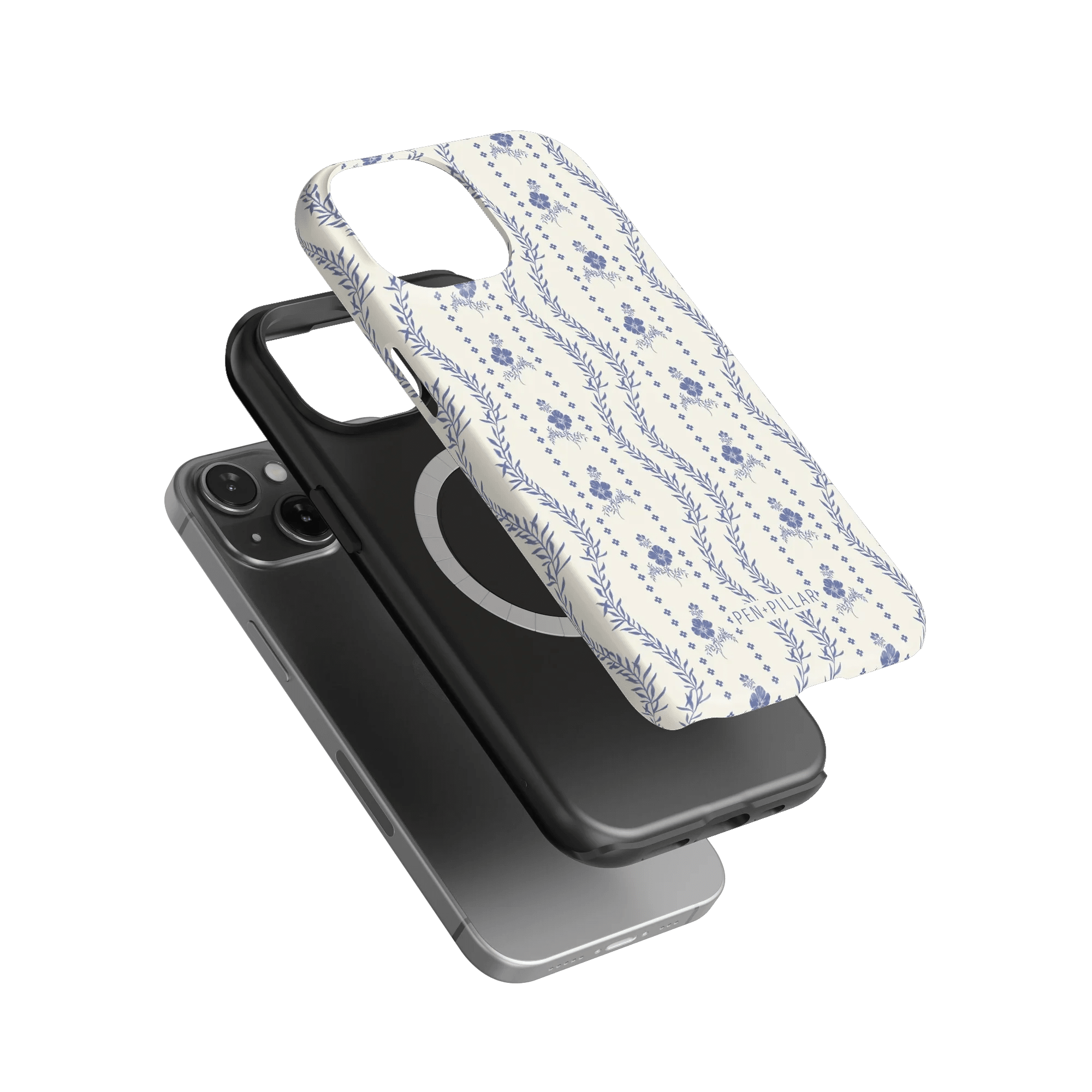 Riviera iPhone case featuring a floral pattern in blue on a white background, stacked with a black phone case.