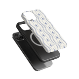 Riviera iPhone case featuring a floral pattern on a white background, displayed above a black phone case.