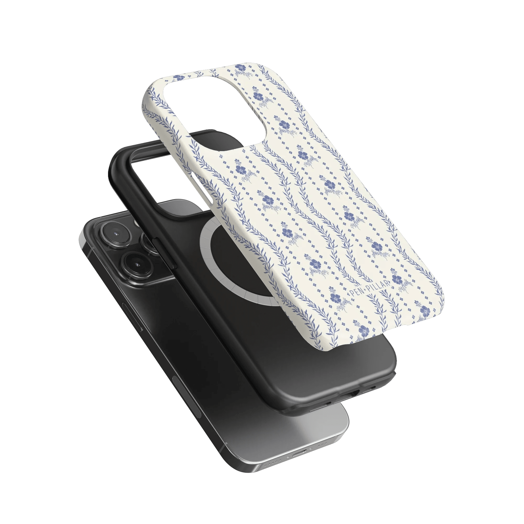 Riviera iPhone case featuring a floral design in blue on a white background, layered over a black phone.