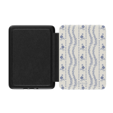 Riviera Kindle case with a floral pattern in blue and white, featuring a black interior and a soft cover.