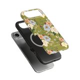 Scarlett iPhone case featuring a floral design with green background and black protective layer.