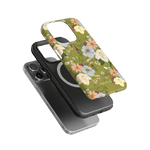 Scarlett iPhone case featuring a floral design with green background and black protective case underneath.
