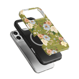 Scarlett iPhone case featuring a floral design with green background and black inner case, shown at an angle.