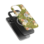 Scarlett iPhone case featuring a floral design with green background and black slim case underneath.