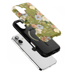Scarlett iPhone case featuring a floral design with green background and black protective shell.
