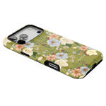 Scarlett iPhone case featuring a floral design with pastel flowers on a green background.