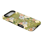 Scarlett iPhone case featuring a floral design with pink, blue, and yellow flowers on a green background.