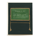 Graduation card featuring a chalkboard with "School is out" and "You did it, grad!" handwritten in white.