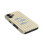 Sea Stripes iPhone case featuring a striped design with three fish illustrations in blue and gray tones.