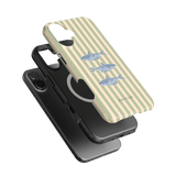 Sea Stripes iPhone case featuring a striped design with blue fish illustrations on a light background.