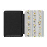 Springtide Kindle case with a floral pattern on a light background and a black interior, designed for protection and style.