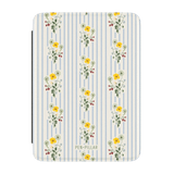 Springtide Kindle case featuring a floral design with yellow and white flowers on a striped blue background.