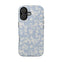 Spritz iPhone case featuring a light blue floral pattern with white flowers and black edges.