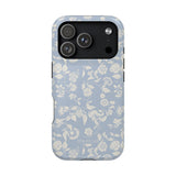 Spritz iPhone case featuring a light blue floral pattern with white flowers and a black camera cutout.