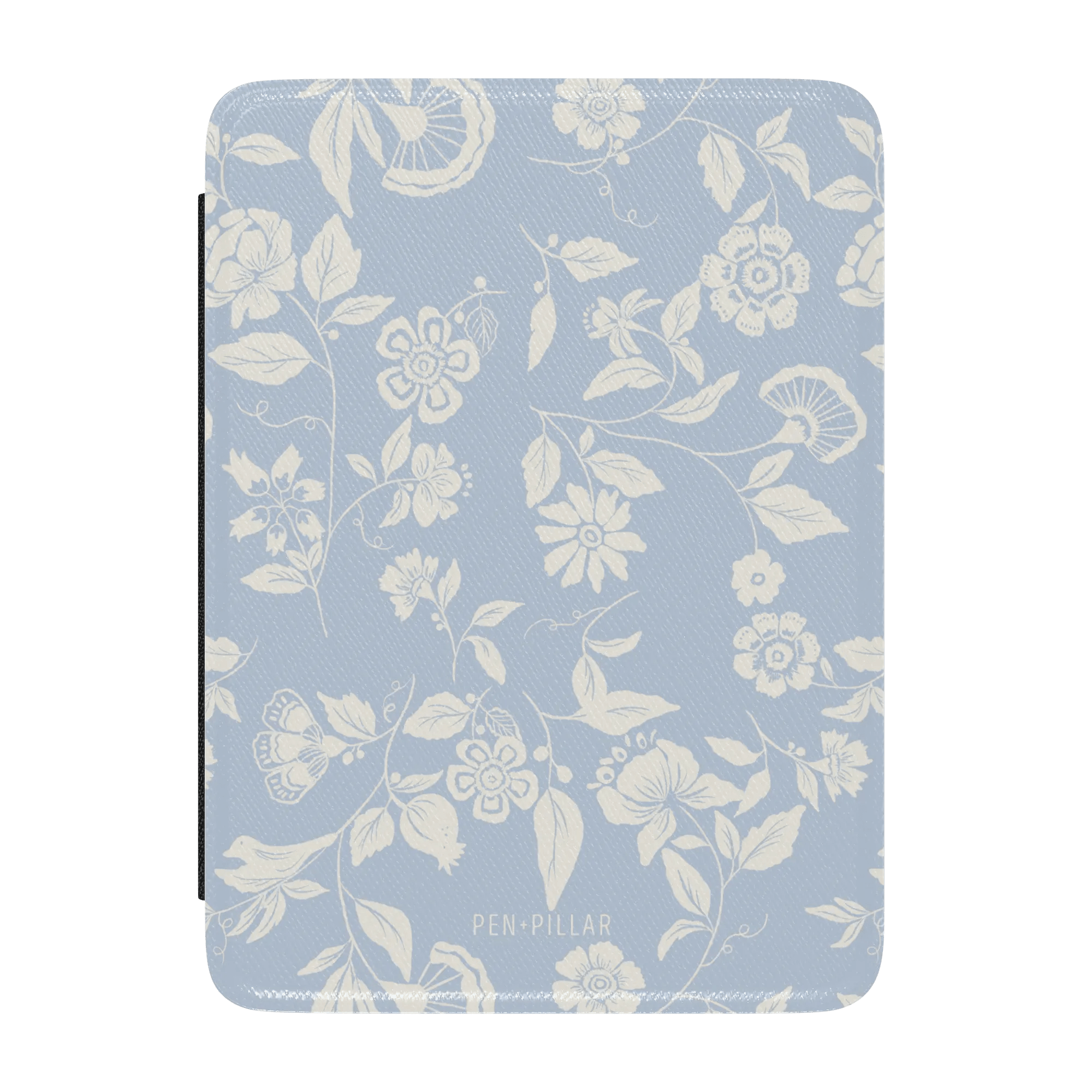 Spritz Kindle case featuring a light blue floral design with white flowers and leaves, labeled "PEN-PILLAR" at the bottom.